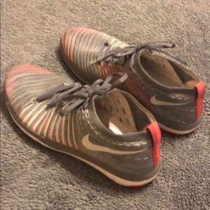 Nikes Womens Flyknit Orange and Grey Sneakers